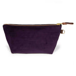 Front of the Royal Purple Velvet Travel Clutch, royal purple velvet, with brass zipper and mahogany leather pull