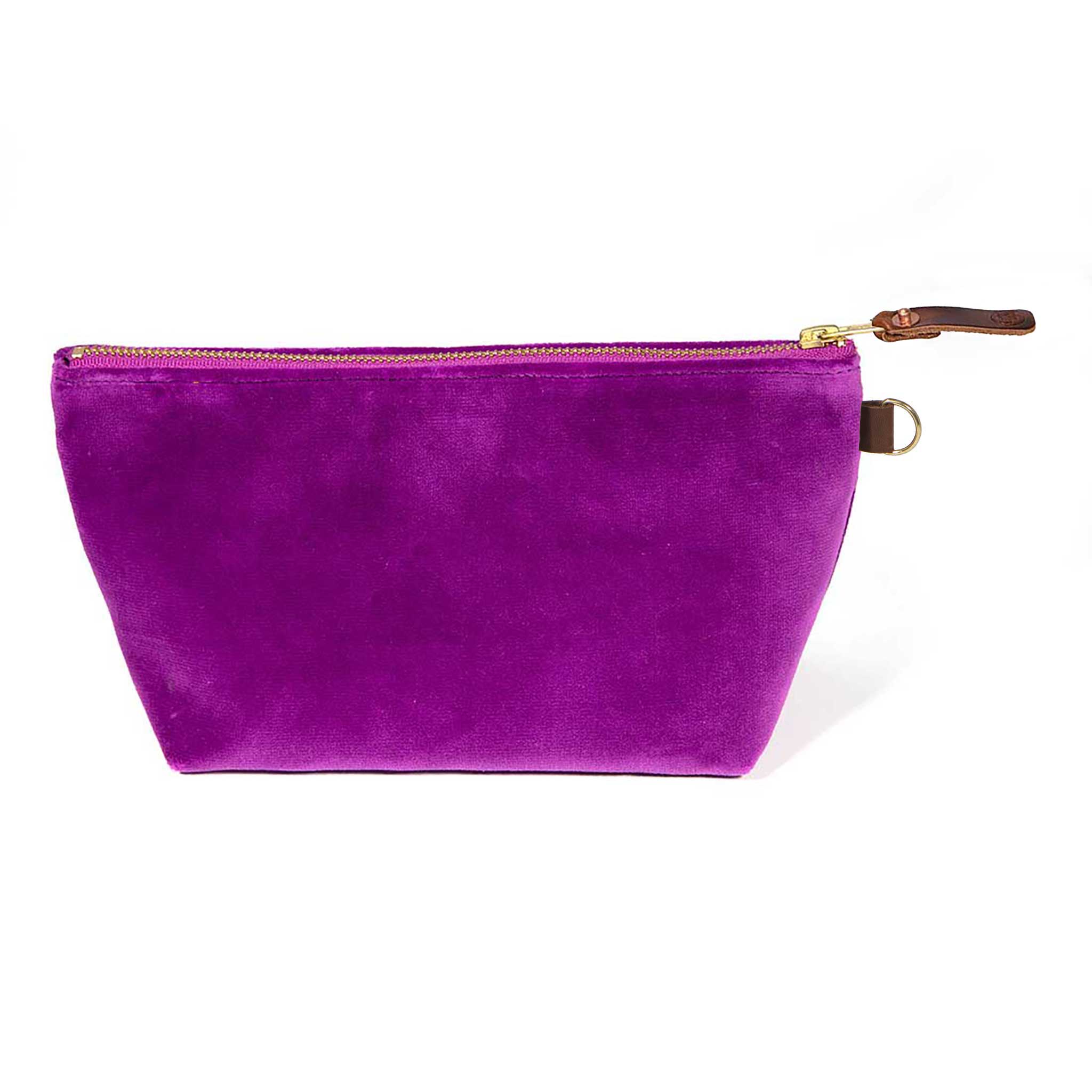 Front of the Fuchsia Velvet Travel Clutch, fuchsia velvet, with brass zipper and mahogany leather pull
