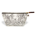 Front of the Cream & Coal Toile Travel Clutch, charcoal toile scenes on cream, with brass zipper and mahogany leather pull