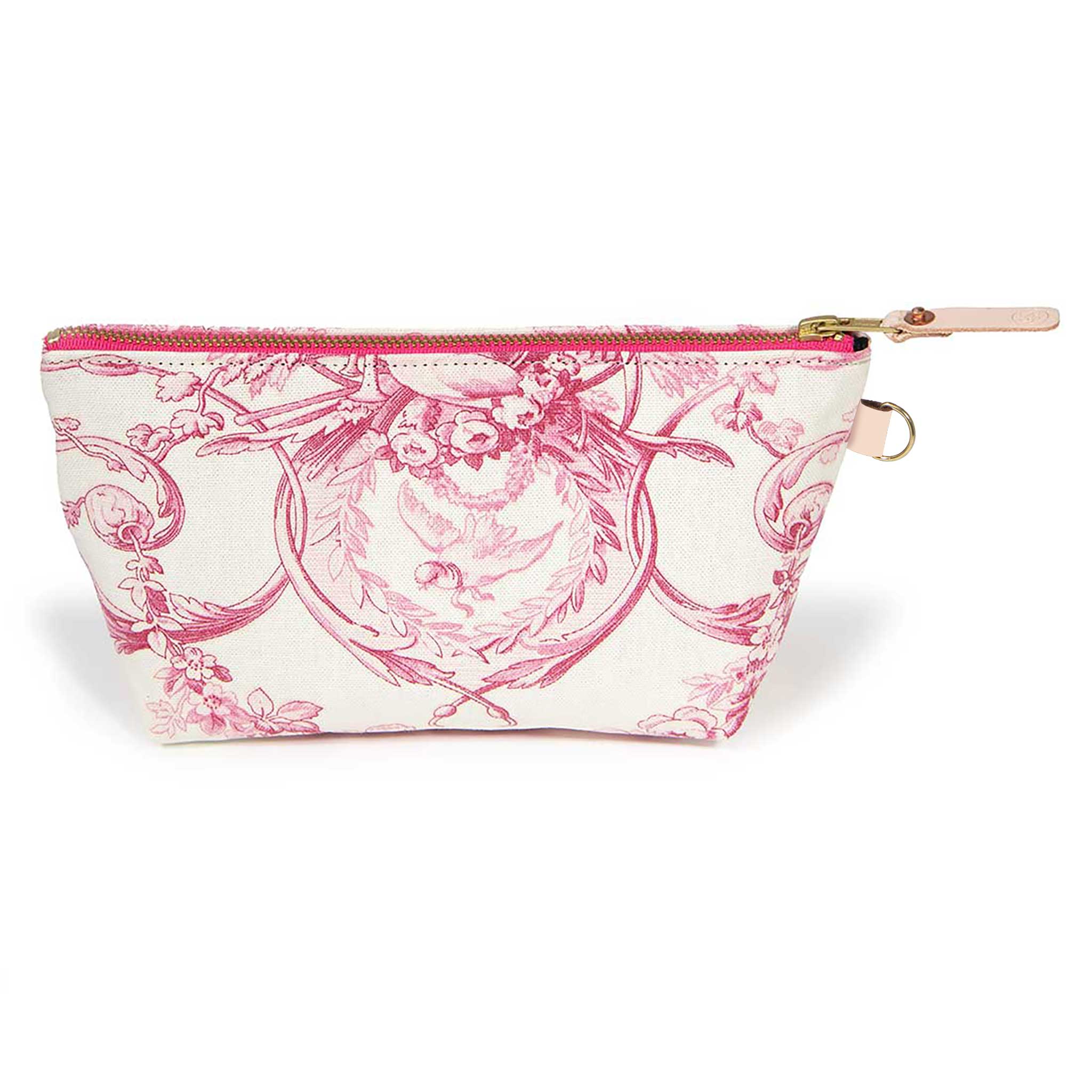 Front of the French Rose Toile Travel Clutch, rose-pink toile scenes on cream, with brass zipper and blonde leather pull