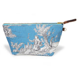 Front of the Cerulean Toile Travel Clutch, white toile scenes on cerulean blue, with brass zipper and mahogany leather pull