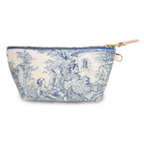 Front of the Delftware Toile Travel Clutch, Delft blue toile on ivory, with brass zipper and blonde leather pull