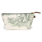 Front of the Butter and Pine Toile Travel Clutch, pine green toile on a butter-cream ground with a brass zipper and leather pull