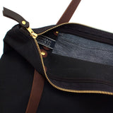 Detail Black waxed canvas portfolio tote with brown leather handles
